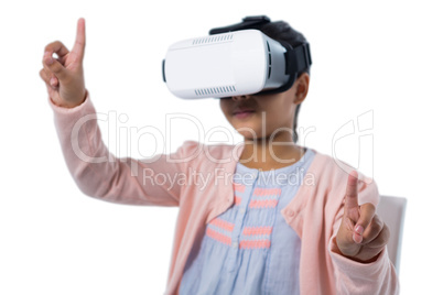 Girl gesturing while using virtual reality headset