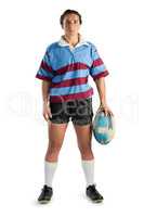 Full length portrait of young female player with rugby ball