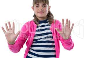 Girl gesturing against white background