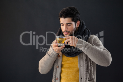 Man having a cup of lemon tea