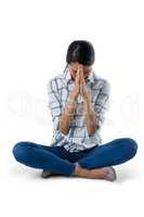 Woman praying against white background