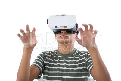 Teenage boy using virtual reality headset