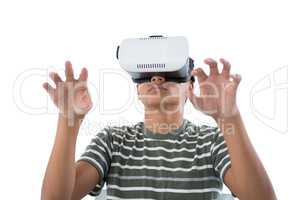 Teenage boy using virtual reality headset