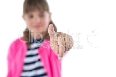 Girl pretending to touch an invisible screen