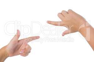 Kid hands gesturing against white background