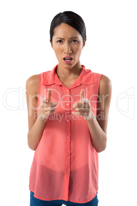 Woman gesturing against white background