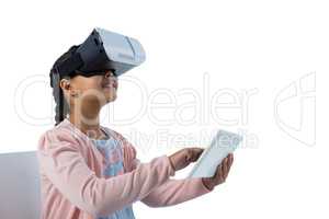 Girl using virtual reality headset and digital tablet