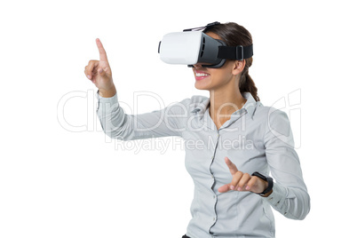 Female executive using virtual reality headset