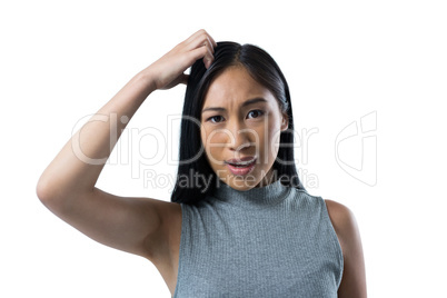 Woman standing against white background