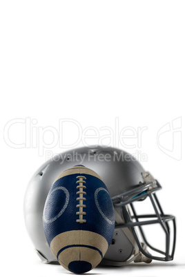 Close-up of sports helmet and football