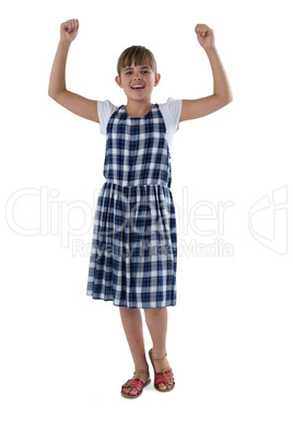 Cute girl gesturing against white background