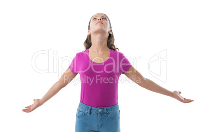 Teenage girl with arms outstretched