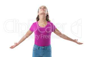 Teenage girl with arms outstretched