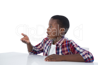 Boy pretending to work on an invisible object