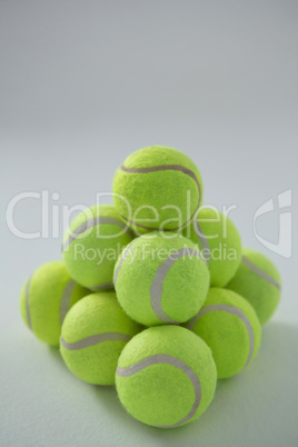 Heap of fluorescent yellow tennis balls