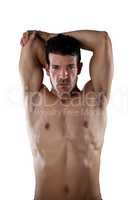 Portrait of determind shirtless sports person stretching hands