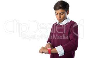 Teenage boy using smartwatch