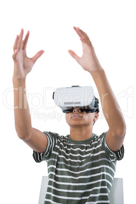 Teenage boy using virtual reality headset