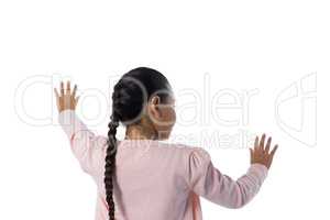 Girl gesturing against white background