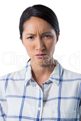 Confused woman against white background