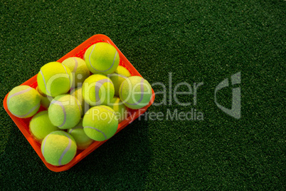 High angle view of tennis balls in container