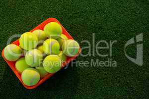 High angle view of tennis balls in container