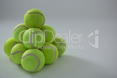 Heap of fluorescent tennis balls