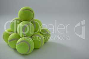 Heap of fluorescent tennis balls