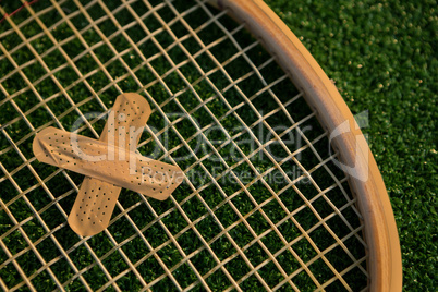 Cropped image of racket with bandage