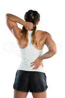 Rear view of woman suffering from pain