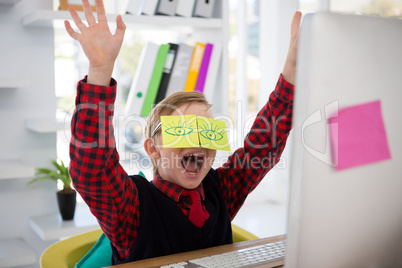 Boy as business executive with sticky notes on his eyes