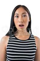 Surprised woman against white background