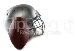 Close-up of helmet and American football