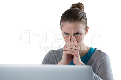 Teenage girl using laptop against white background