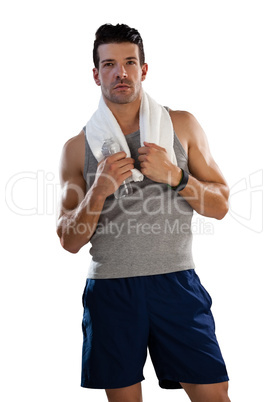 Portrait of tired sportsman with towel and bottle