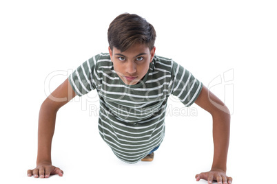 Teenage boy performing push ups