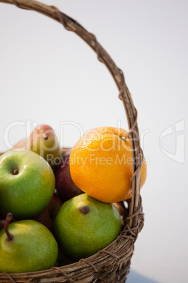 Close-up of various fruits in wicker basket