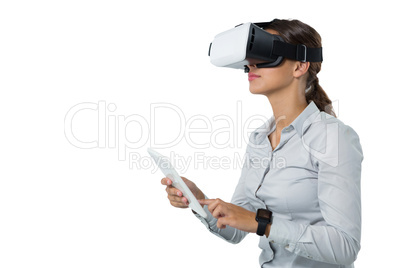 Female executive using virtual reality headset