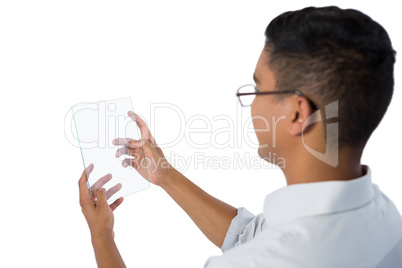 Man using glass digital tablet
