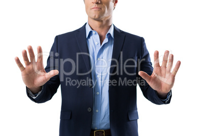 Businessman touching the invisible screen