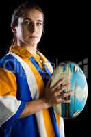 Portrait of confident female rugby player