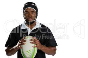 Portrait of male rugby player wearing helmet