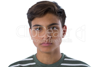 Teenage boy against white background