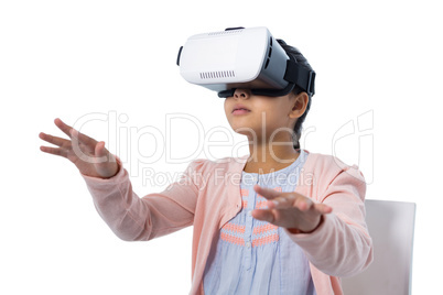 Girl gesturing while using virtual reality headset