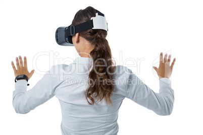 Female executive using virtual reality headset