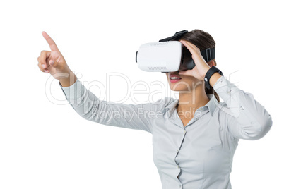 Female executive using virtual reality headset