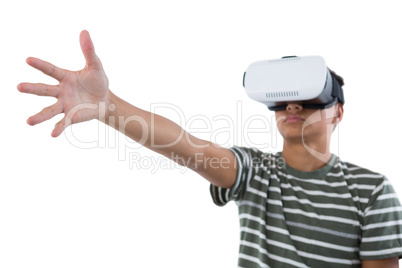 Teenage boy using virtual reality headset