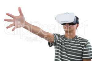 Teenage boy using virtual reality headset