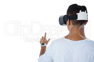 Rear view of man using virtual reality headset