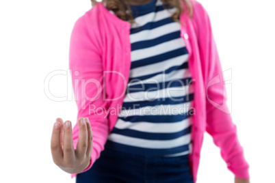 Girl pretending to be holding invisible object